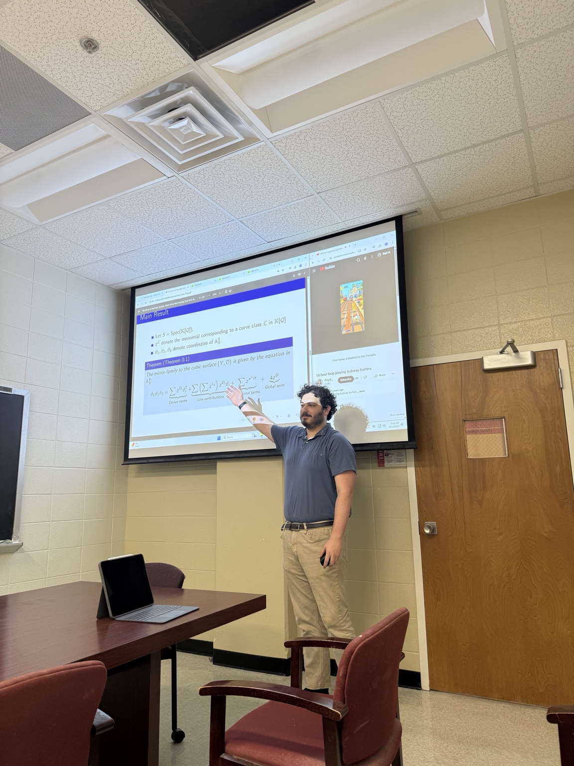 Teaching in front of a Chalkboard